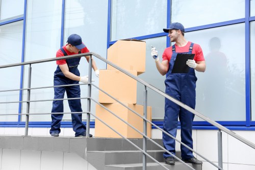 Apartment removal team handling furniture in Oakleighpark
